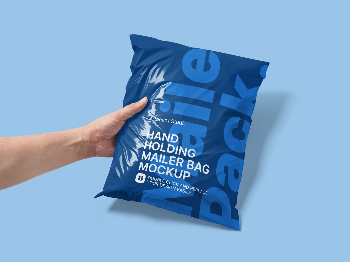 Hand Holding Plastic Mailer Bag Mockup — Mockup Zone